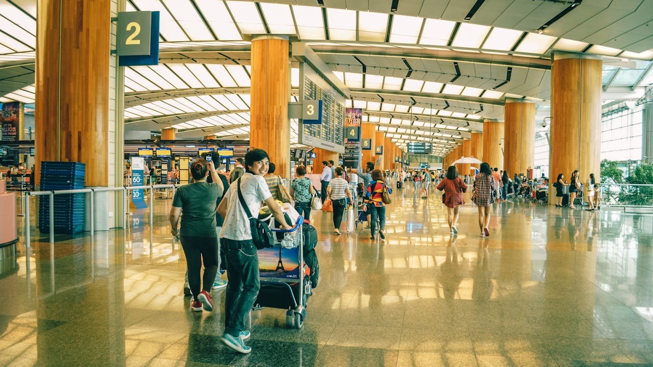 Passengers walking to board the plane