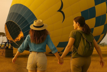 Two tourists going for a hot air balloon ride